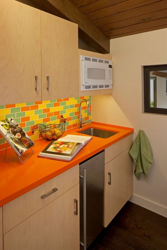 Orange Corian Countertop Kitchen - Susan Jay Design
